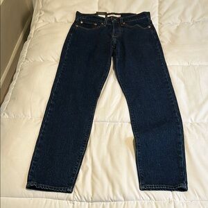 Never been worn!! Wedgie Levi’s. A High Rise, snug through the hip and thigh.